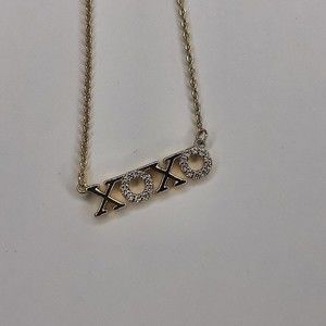 Stella $ Dot xoxo gold and crytal necklace